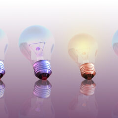 One glowing bulb which illustrates "standing out from the others"